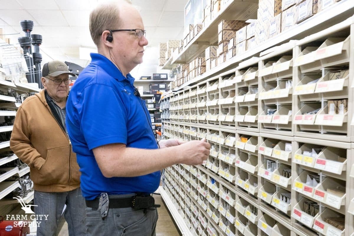 Man standing in hardware aisle
