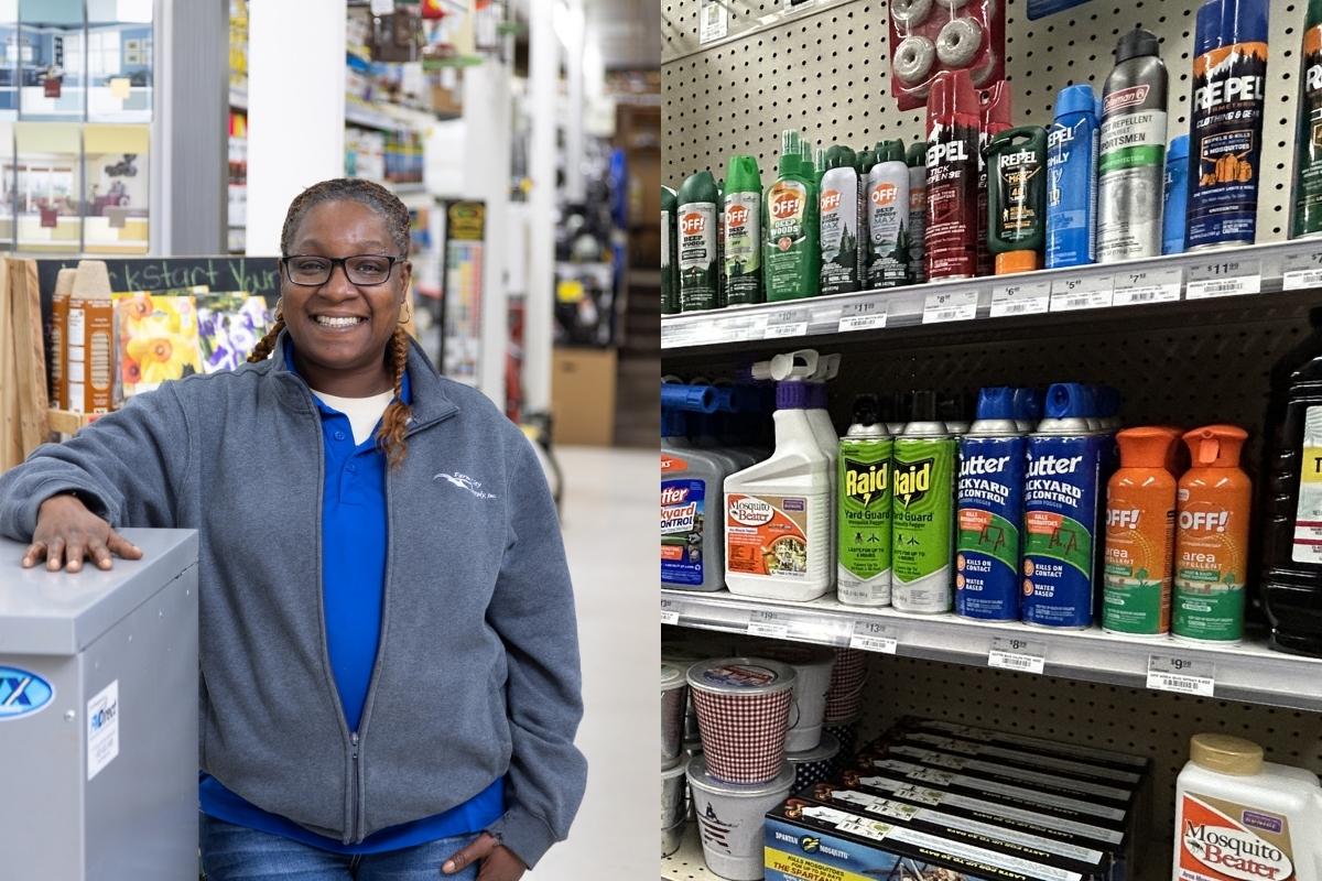 Farm City Supply team member standing near bug control products and insect repellents inside Farm City Supply.
