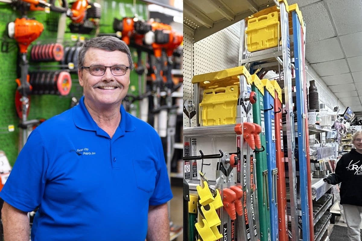 Farm City Supply team member standing in the paint department beside lawn care and weed control supplies.