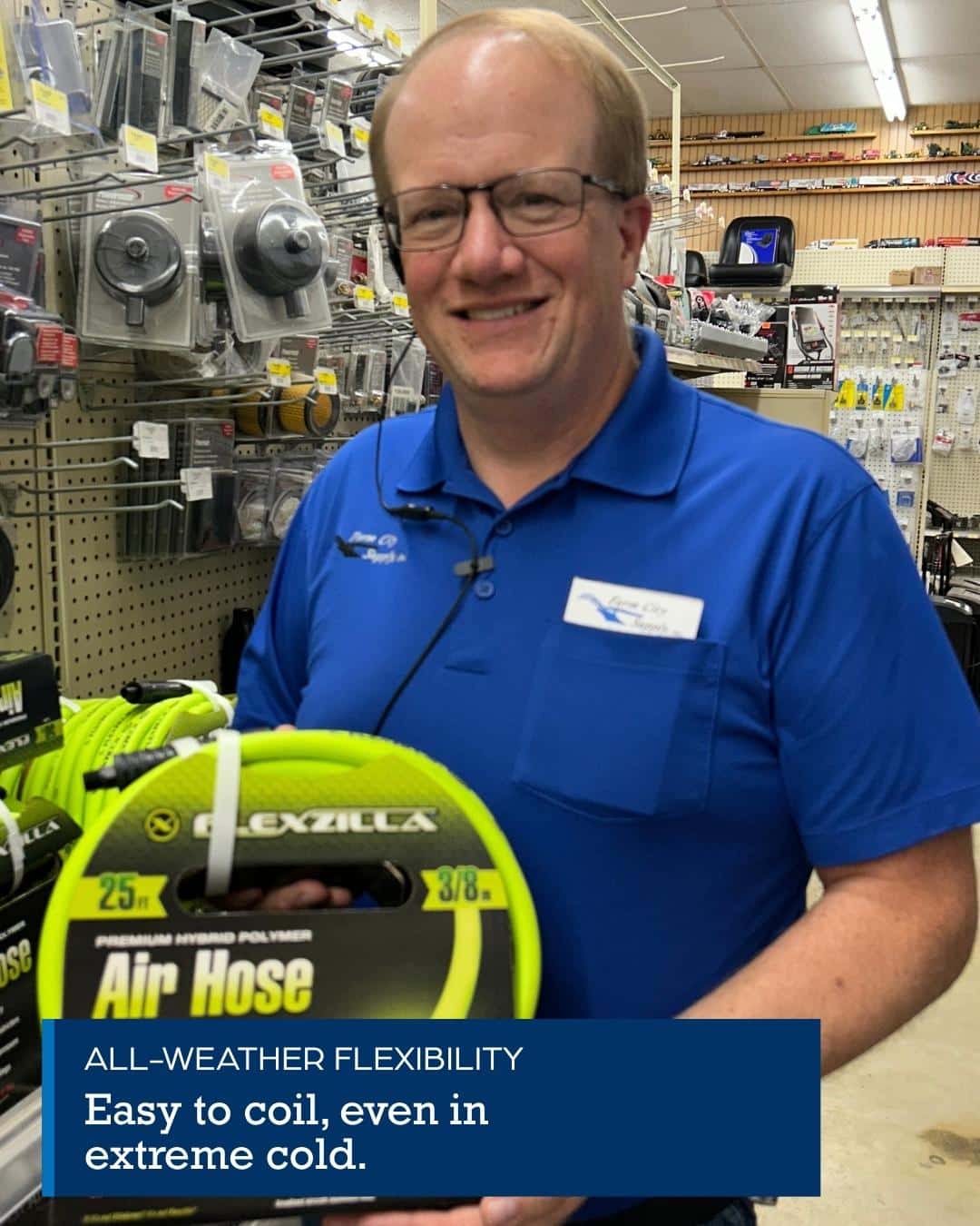 Farm City Supply employee holding a bag of Spectracide Triazicide Insect Killer for Lawns in the pest-control aisle.